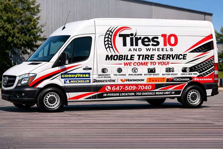 Professional mobile tire service technician at work in North York